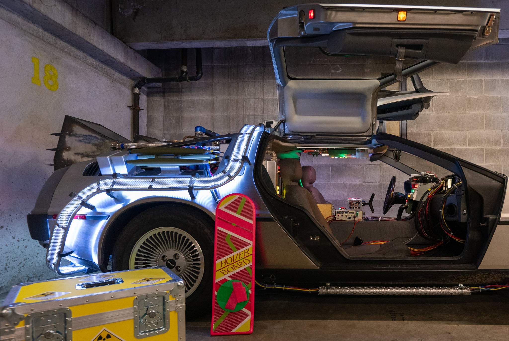 DeLorean 'Time Machine' replica exterior: Time circuit switch, gull-wing doors, time bands, a hoverboard, and a case of plutonium.